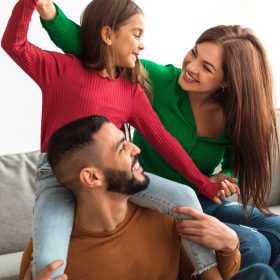 portrait-happy-arab-family-playing-having-fun-home